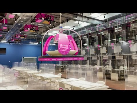 Food served up robotically at Beijing Olympics