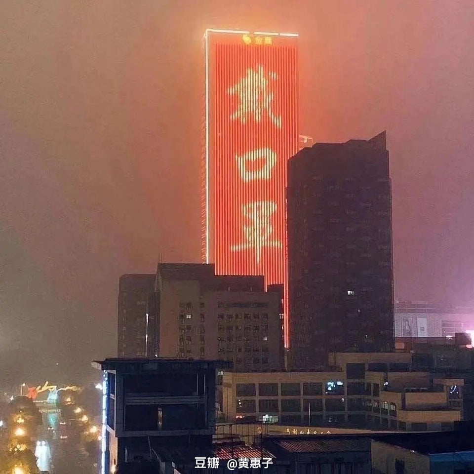 Building in China says 'Wear a Mask' due to Virus Outbreak