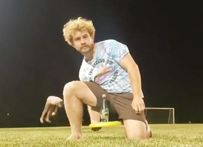 Perfectly timed bottle flip with frisbee