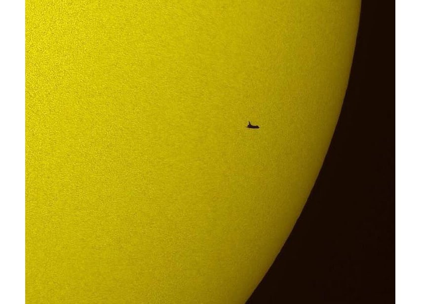 Space Shuttle Atlantis transiting our star, The Sun, during the st-125 mission